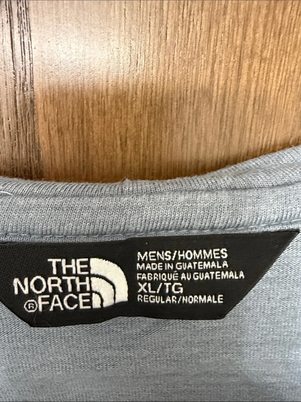 The North Face Men’s Light Gray Hooded Pullover with Yellow Logo